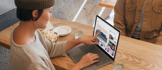 A Tasklane designer working on a laptop